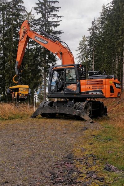 Prozessorbagger Doosan DX210W-5 + P60